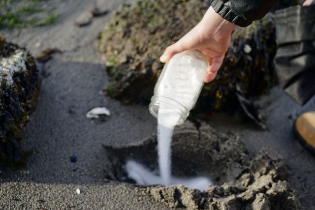 Pouring salt into the earth